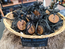 Hand burned wooden pendants with Pagan sigils and Nordic bindrunes