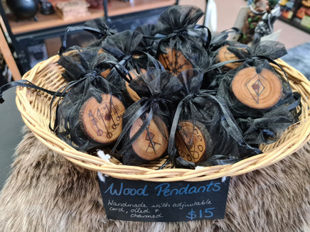 Hand burned wooden pendants with Pagan sigils and Nordic bindrunes