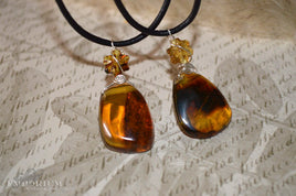 Amber pendant - leather cord