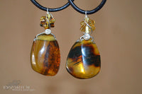 Amber pendant - leather cord