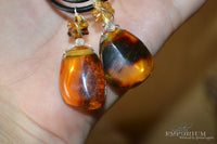 Amber pendant - leather cord